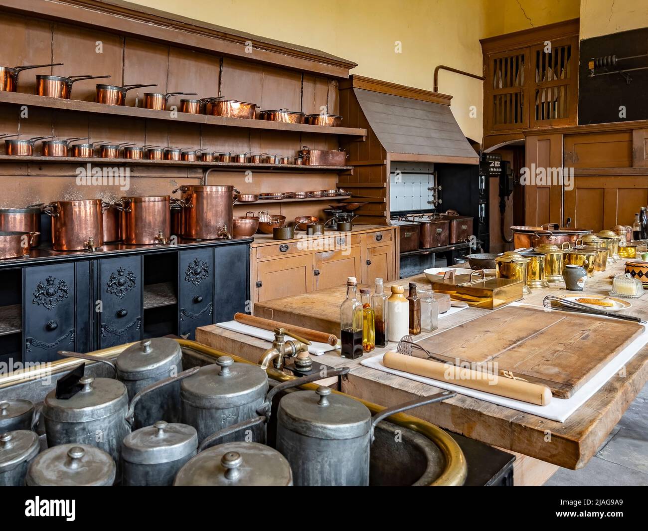 The 18th Century Kitchen at Petworth House in West Sussex, United Kingdom.  Petworth is a late 17th-century Grade I listed country house, rebuilt in 1 Stock Photo