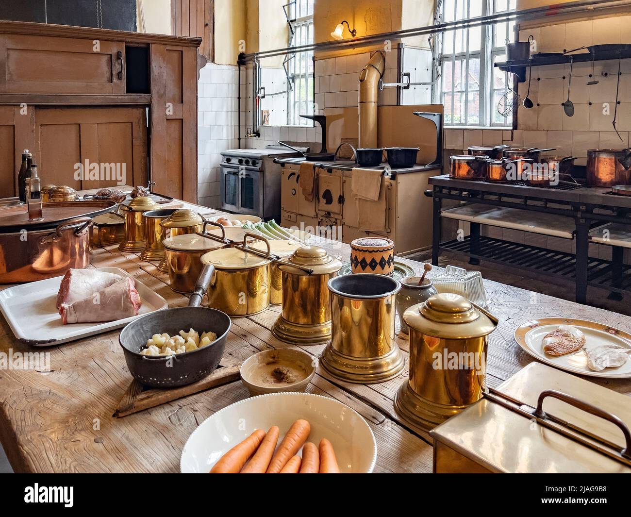 The 18th Century Kitchen at Petworth House in West Sussex, United Kingdom.  Petworth is a late 17th-century Grade I listed country house, rebuilt in 1 Stock Photo