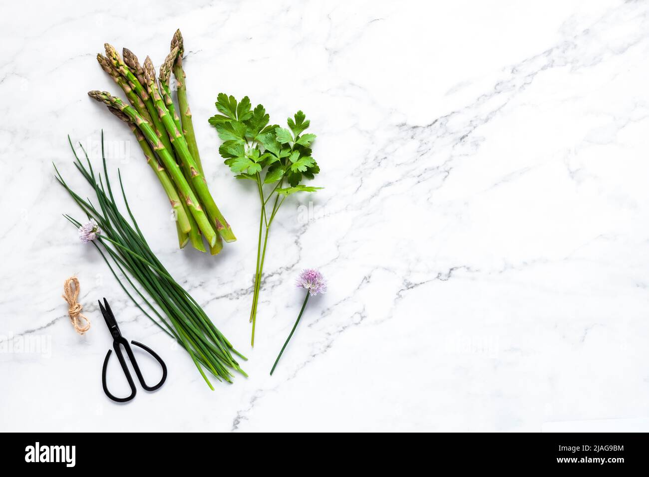 Asparagus, chive and parsley of the home garden Stock Photo