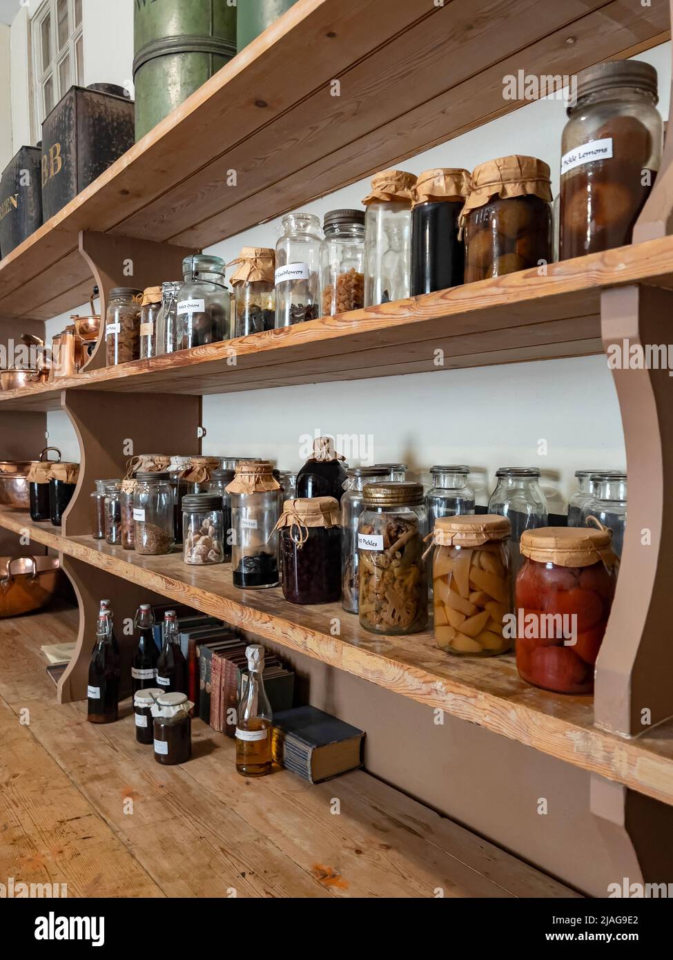 Spice rack in an 18th Century kitchen at Petworth house in West Sussex, United Kingdom. Stock Photo