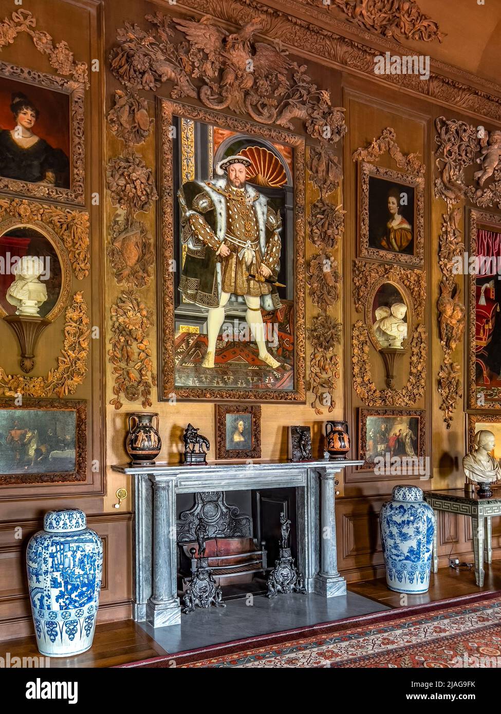 The Carved Room at Petworth House in West Sussex, United Kingdom.  Petworth is a late 17th-century Grade I listed country house, rebuilt in 1688 by Ch Stock Photo