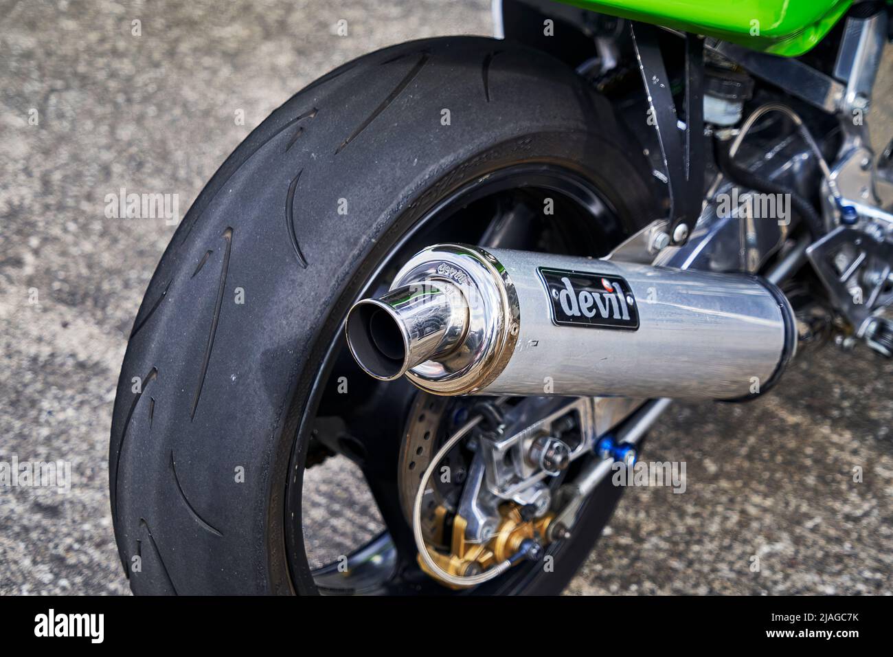 devil exhaust on a racing motorcycle with sliks, exhaust system from