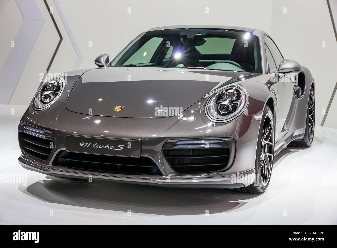 Porsche 911 Turbo S sports car at the Brussels Expo Autosalon motor show. Brussels - January 12, 2016. Stock Photo