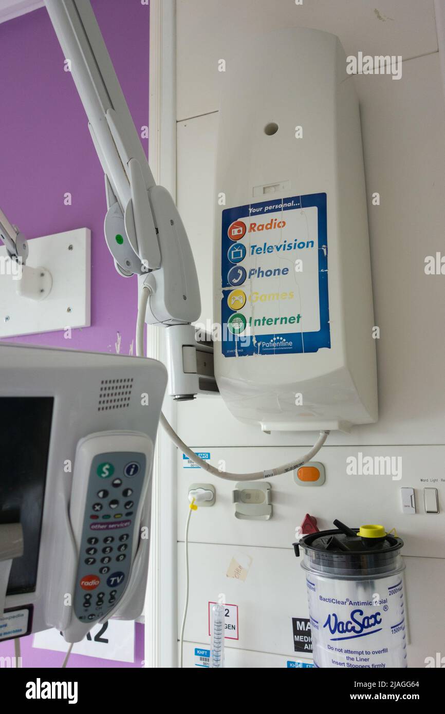 Closeup of a nonoperational Hospedia bedside TV, phone and entertainment system at Kingston hospital, London, England, UK Stock Photo
