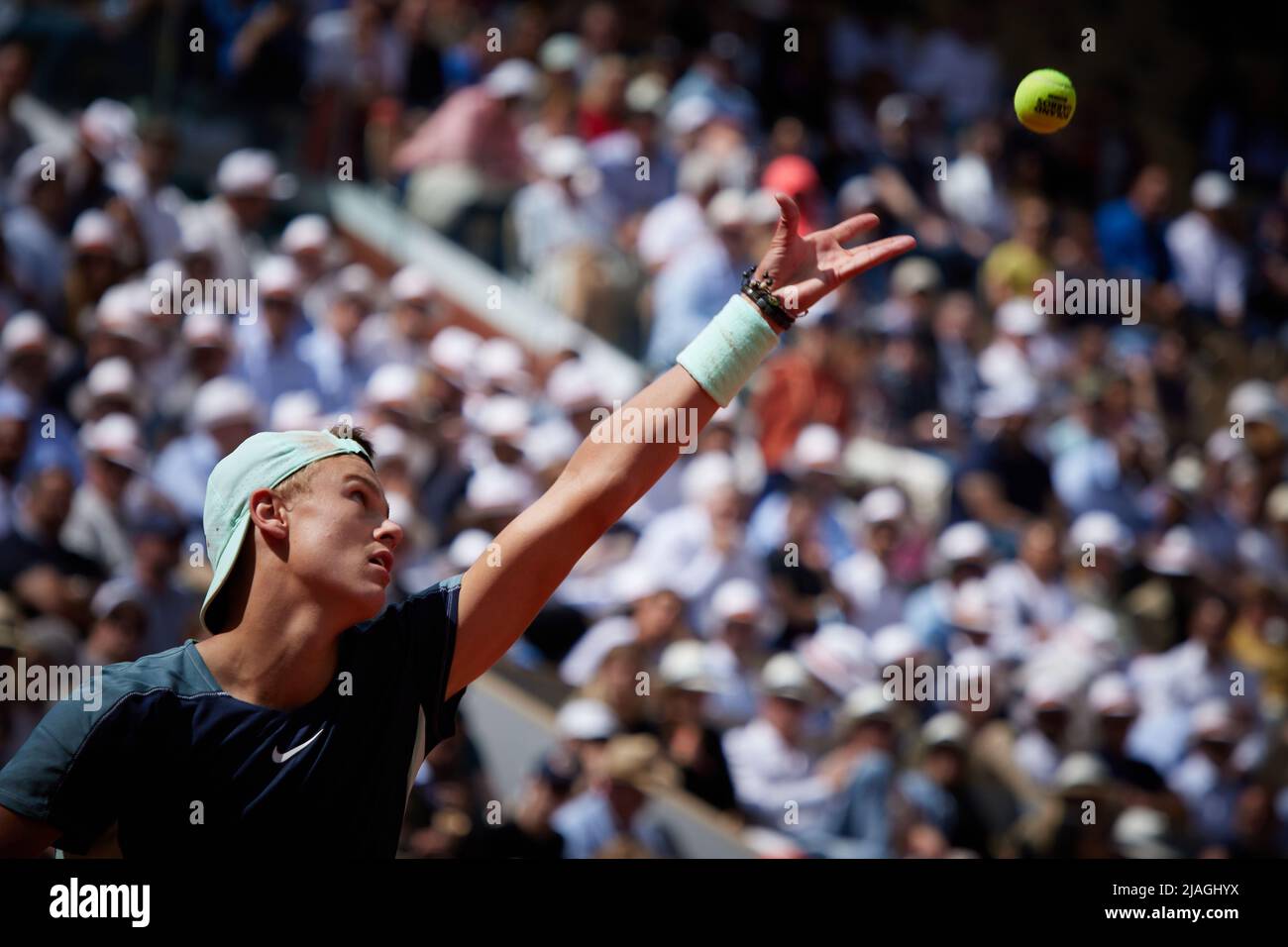 Paris, France. 30th May, 2022. Holger Rune of Denmark serves during the men's singles fourth round match against Stefanos Tsitsipas of Greece at the French Open tennis tournament at Roland Garros in Paris, France, May 30, 2022. Credit: Meng Dingbo/Xinhua/Alamy Live News Stock Photo