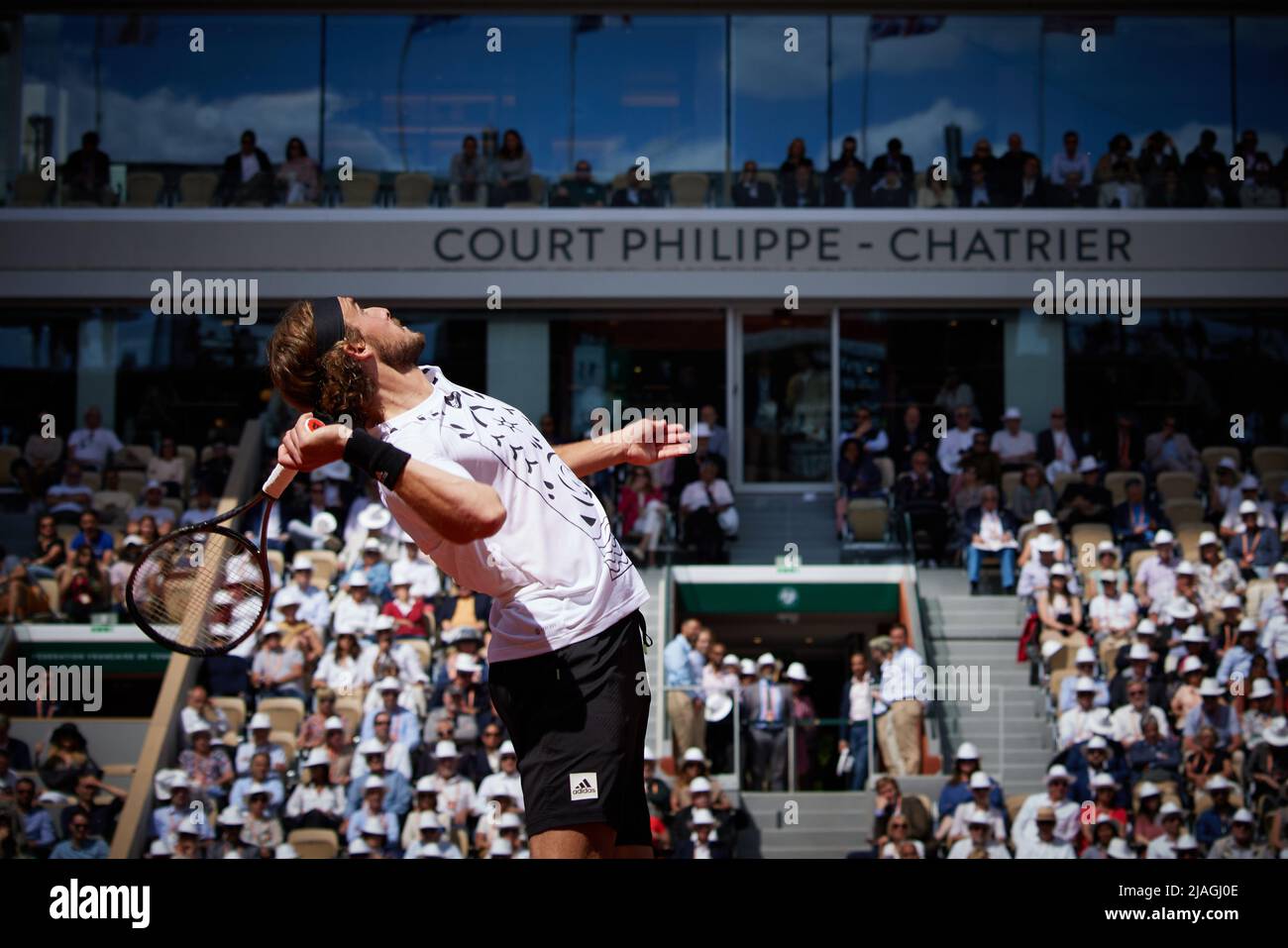 Paris, France. 30th May, 2022. Stefanos Tsitsipas of Greece serves during the men's singles fourth round match against Holger Rune of Denmark at the French Open tennis tournament at Roland Garros in Paris, France, May 30, 2022. Credit: Meng Dingbo/Xinhua/Alamy Live News Stock Photo