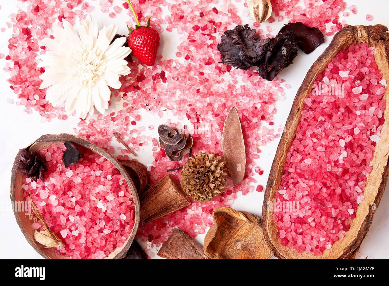 Magnesium pink bath salt, dried herbs, flowers and coconut and cacao in