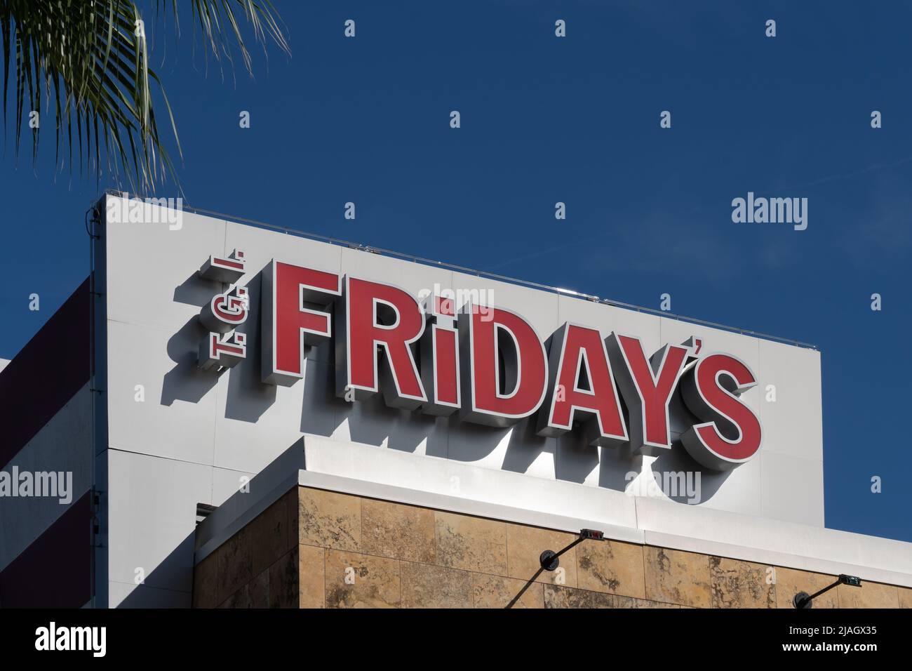 Orlando, Fl, USA - January 6, 2022: Close up of TGI Fridays restaurant sign on the building in Orlando, Fl, USA. Stock Photo