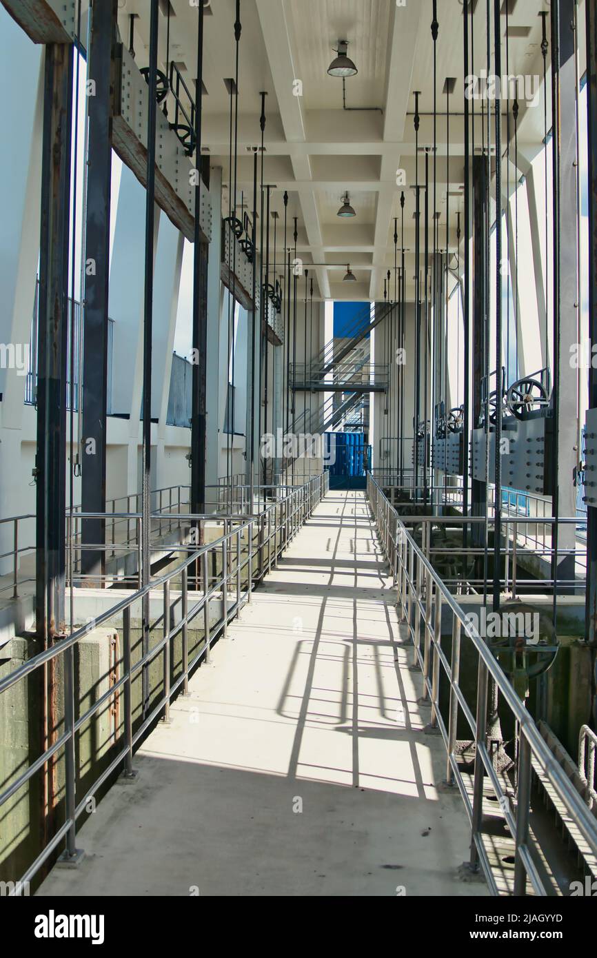 Pulleys and cables of the Cleveringsluizen, drainage locks and sluices that are part of the water management in Lauwersoog, north of the Netherlands Stock Photo