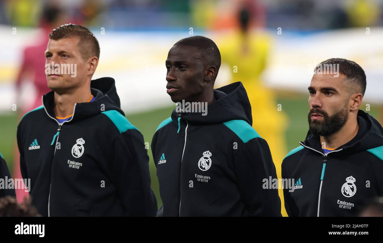 Paris, France, 28th May 2022. Toni Kroos, Ferland Mendy and Daniel Carvajal  of Real Madrid look on during the line up prior to the UEFA Champions  League match at Stade de France,