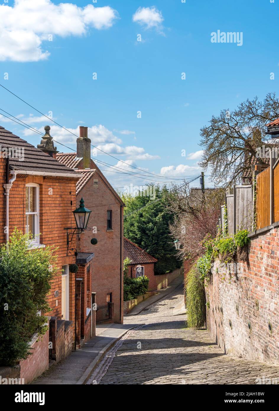 View down Well Lane across Steep Hill to St Martins Street Lincoln old town 2022 Stock Photo