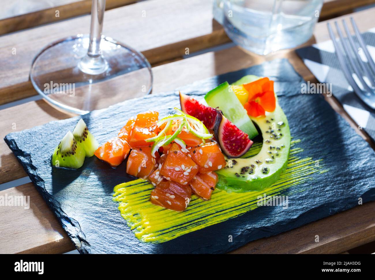Tartar with tuna, avocado, mango sauce Stock Photo Alamy