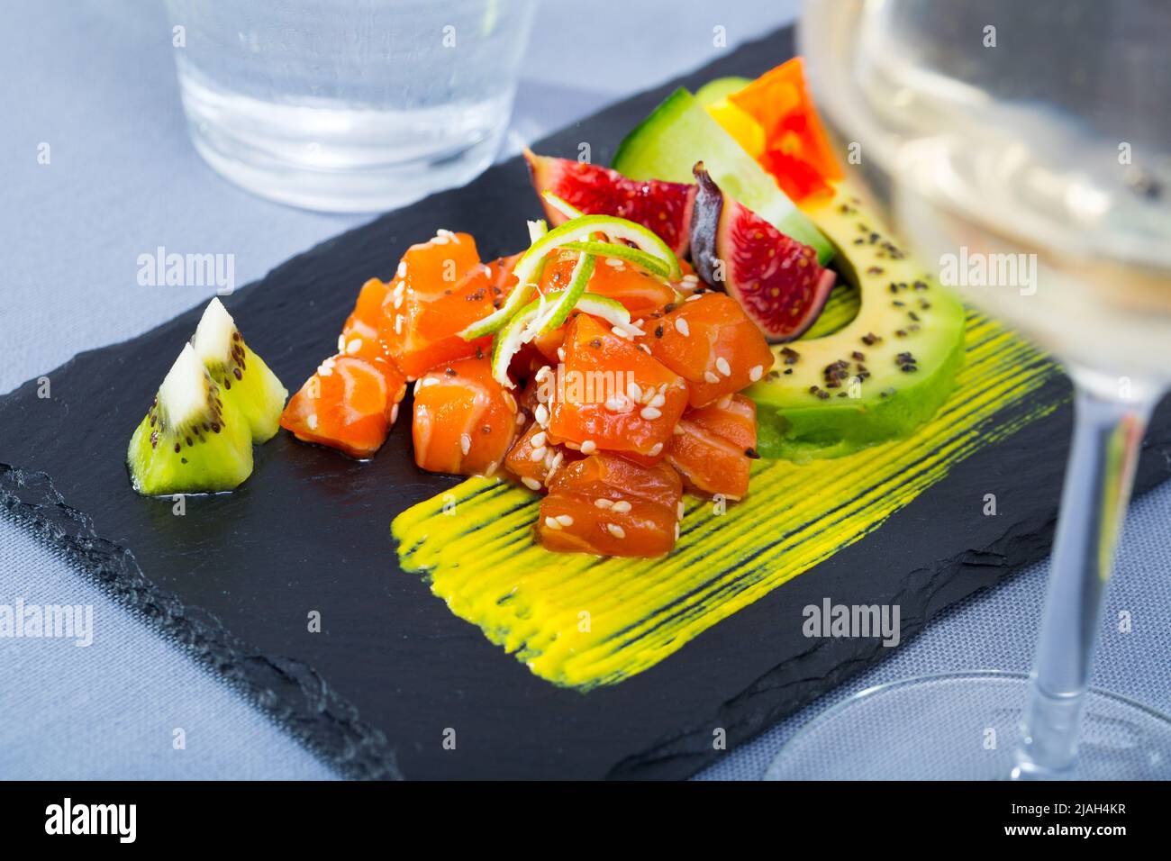 Tuna tartare with avocado and spicy mango sauce Stock Photo Alamy