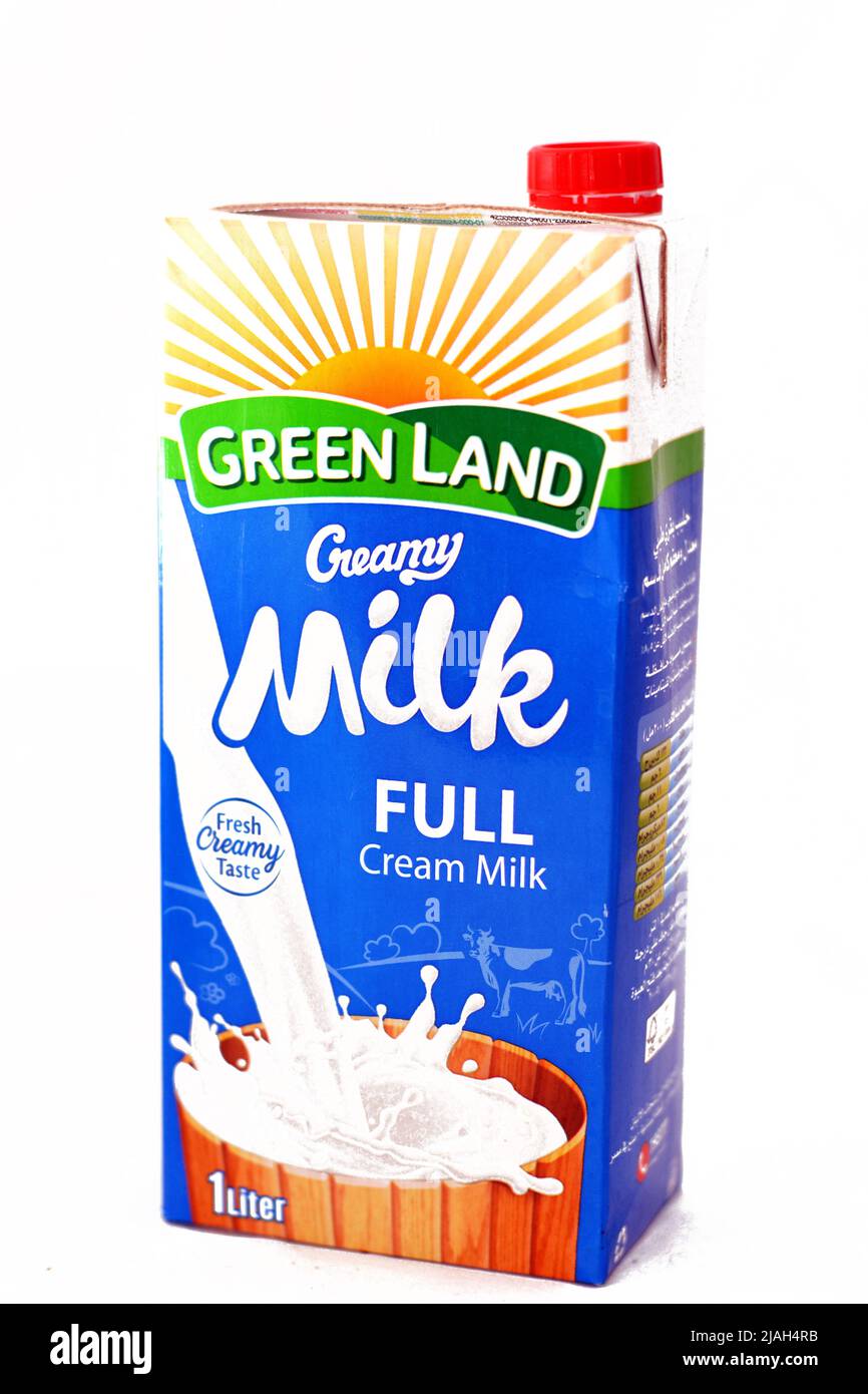 Cairo, Egypt, May 24 2022: GreenLand full fat creamy fresh cow's milk of 1 one liter container with nutrients and minerals, selective focus of natural Stock Photo