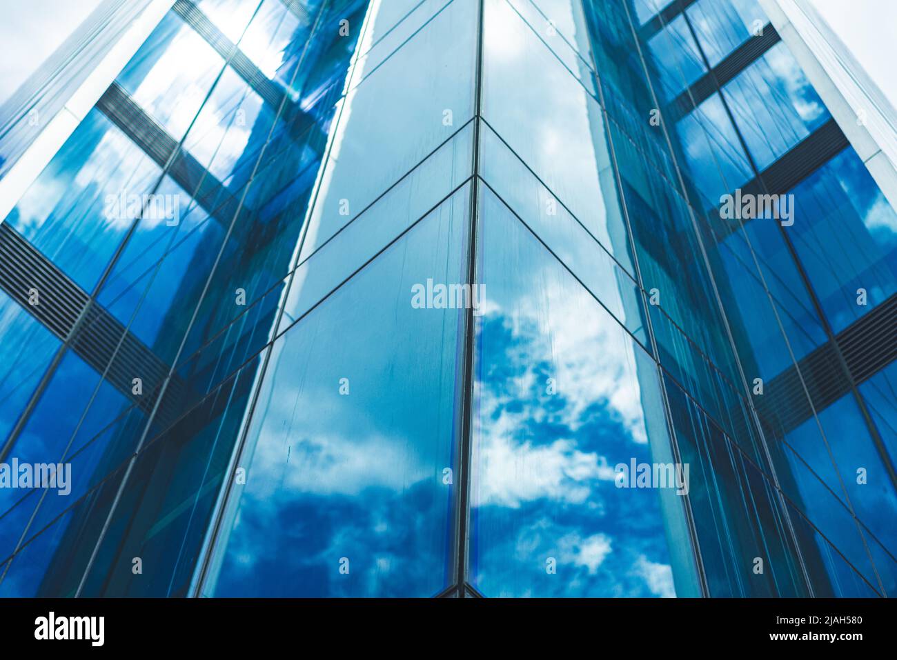 underside panoramic and perspective view to steel blue glass high rise building skyscrapers, business concept of successful industrial architecture Stock Photo