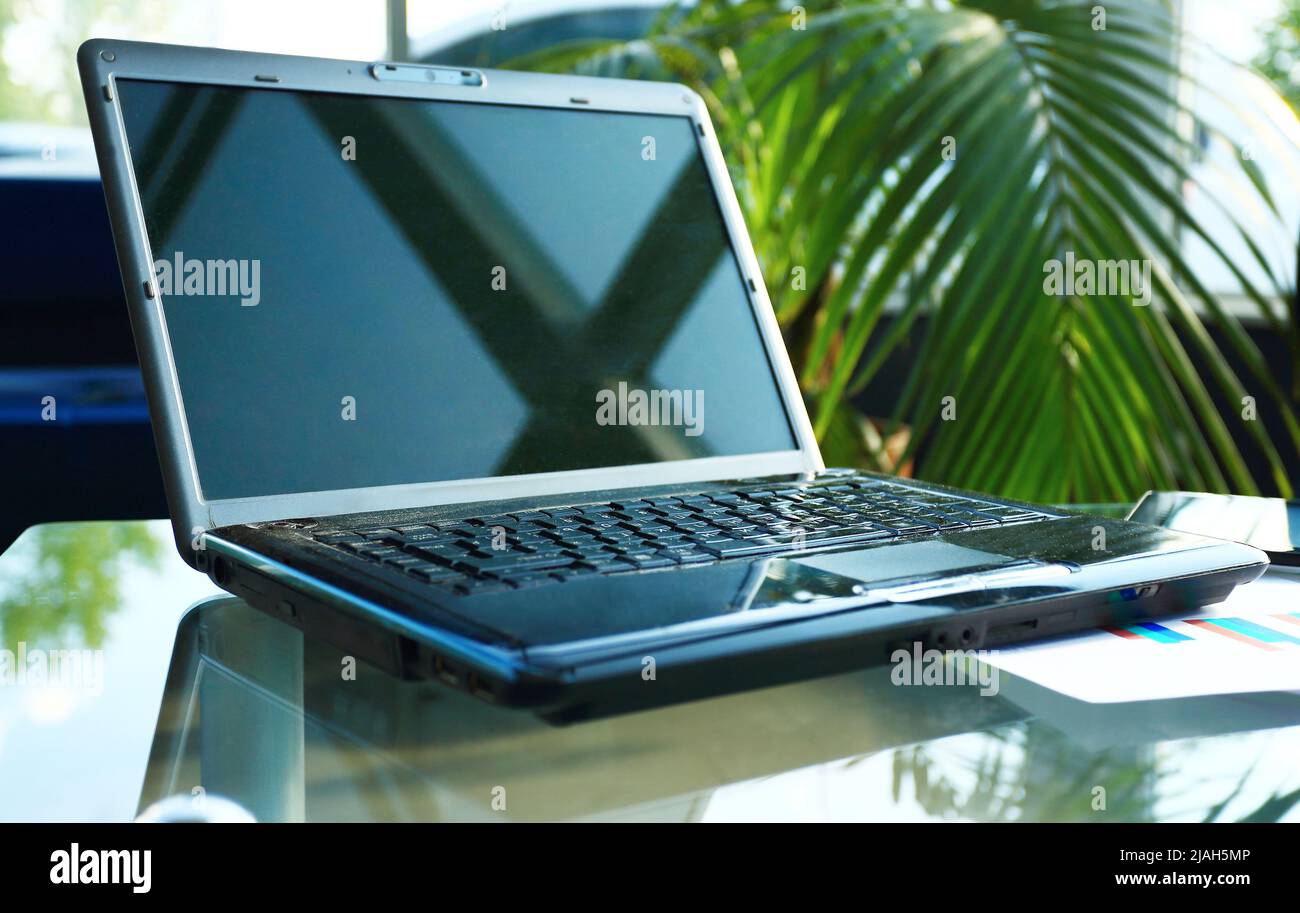Closeup photo of laptop computer with open top. Blank screen Stock