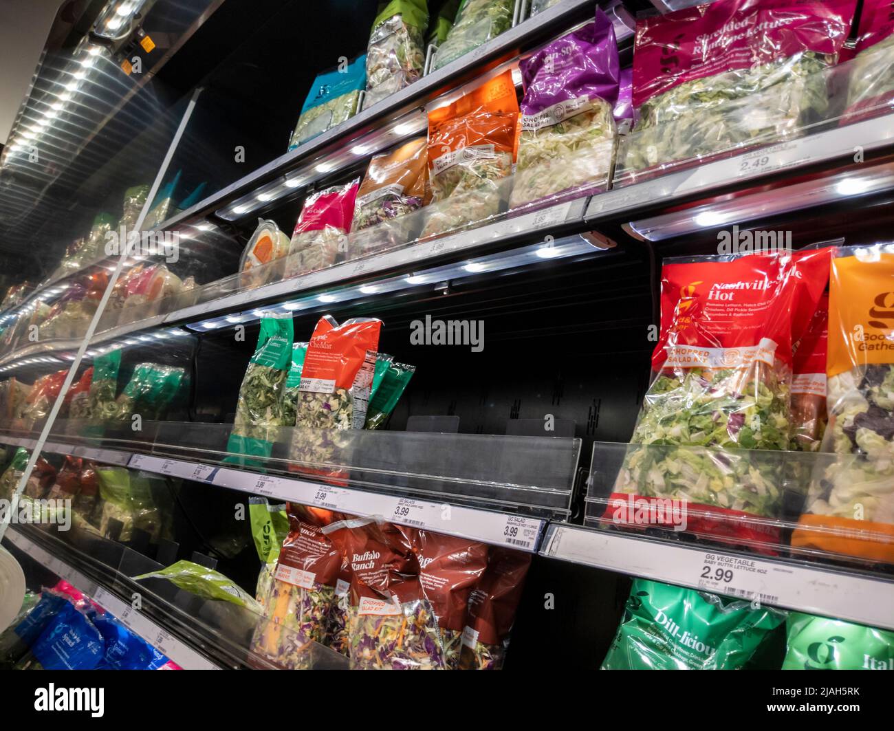 Lynnwood, WA USA - circa April 2022: Angled view of a variety of pre-made salad mixes for sale inside a Target store. Stock Photo
