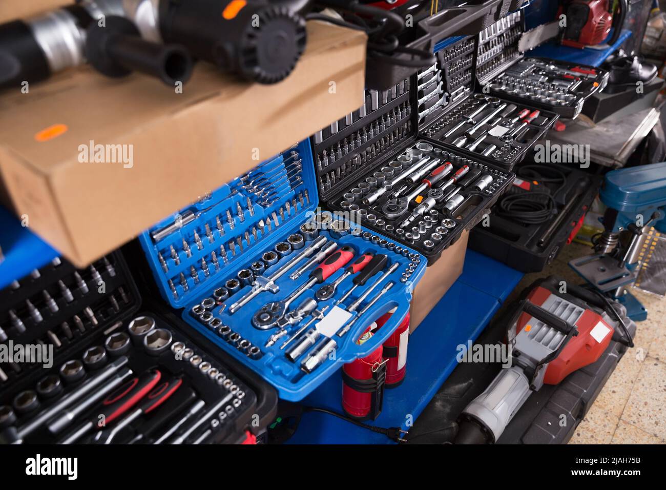 Showcase of instruments in store Stock Photo - Alamy