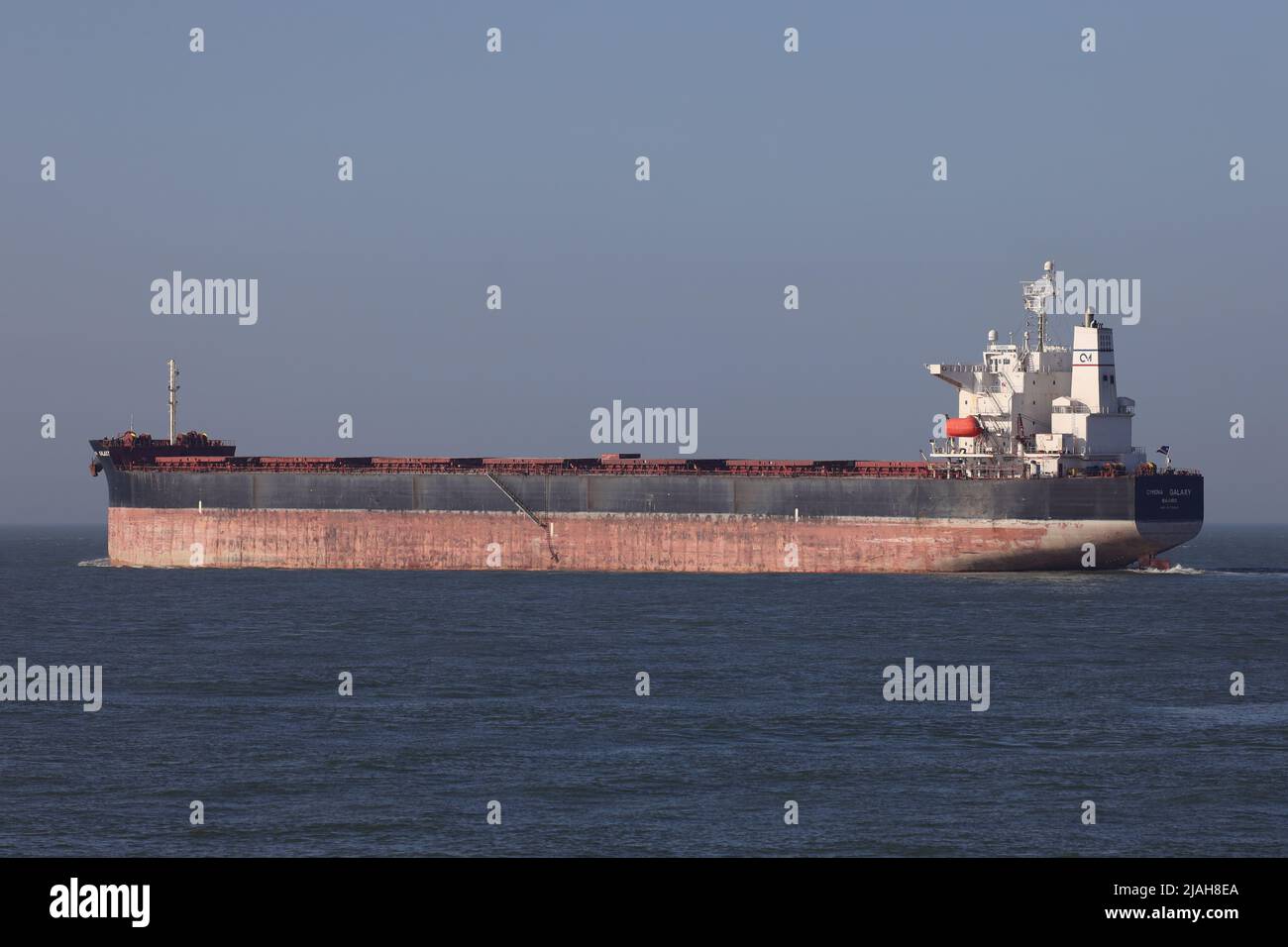 The bulk carrier Cymona Galaxy leaves the port of Rotterdam on March 18, 2022. Stock Photo