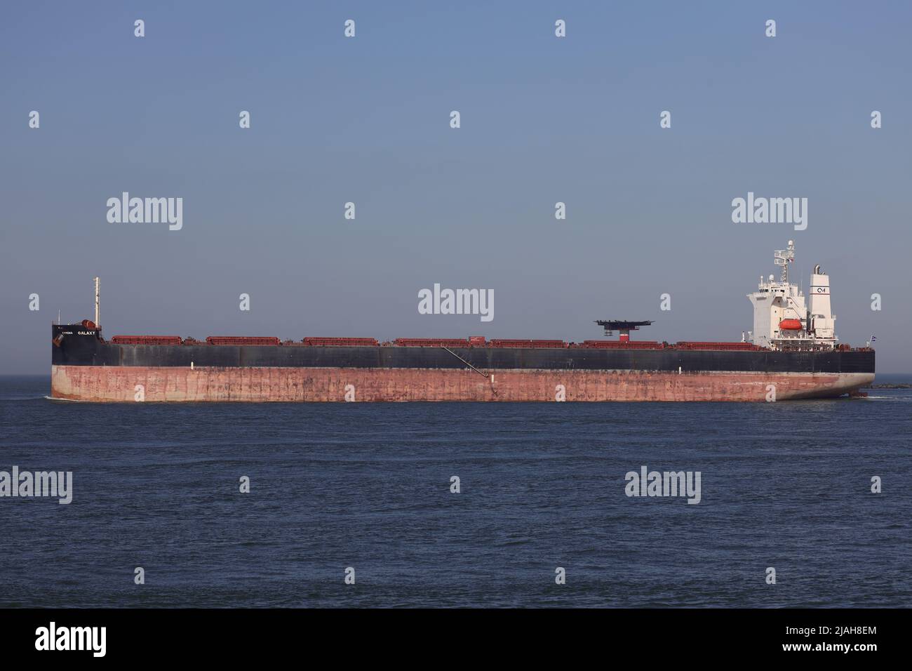 The bulk carrier Cymona Galaxy leaves the port of Rotterdam on March 18, 2022. Stock Photo