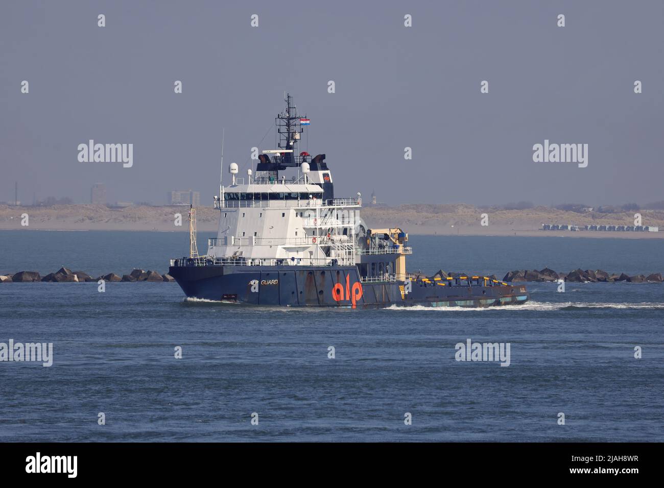 The offshore tugboat ALP Guard leaves the port of Rotterdam on March 18, 2022. Stock Photo