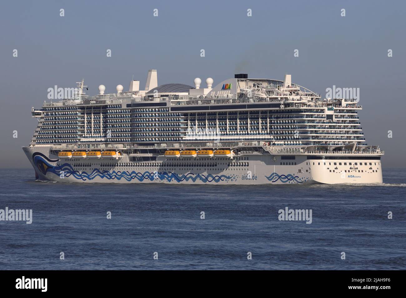 The cruise ship AIDAcosma leaves the port of Rotterdam on March 18, 2022. Stock Photo