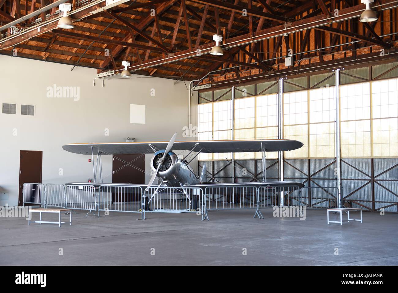 IRVINE, CALIFORNIA - 31 JAN 2020: N3N-3 Canary vintage Biplane on display in the hangar at the Orange County Great Park. Stock Photo