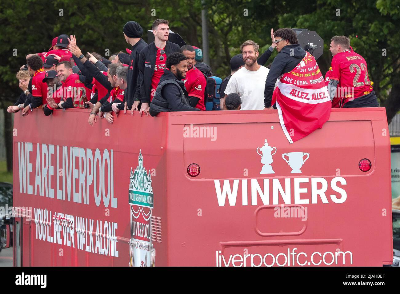 The Liverpool FC squad along with DJ Calvin Harris during the open top