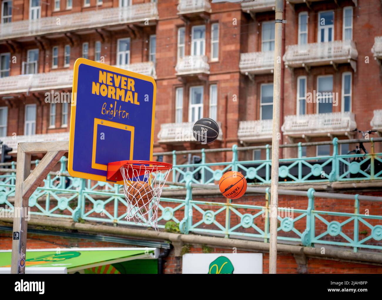 Basketball practise on the seafront court Stock Photo