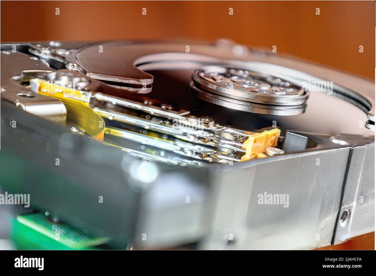 Detail lateral view of an opened hard disk Stock Photo