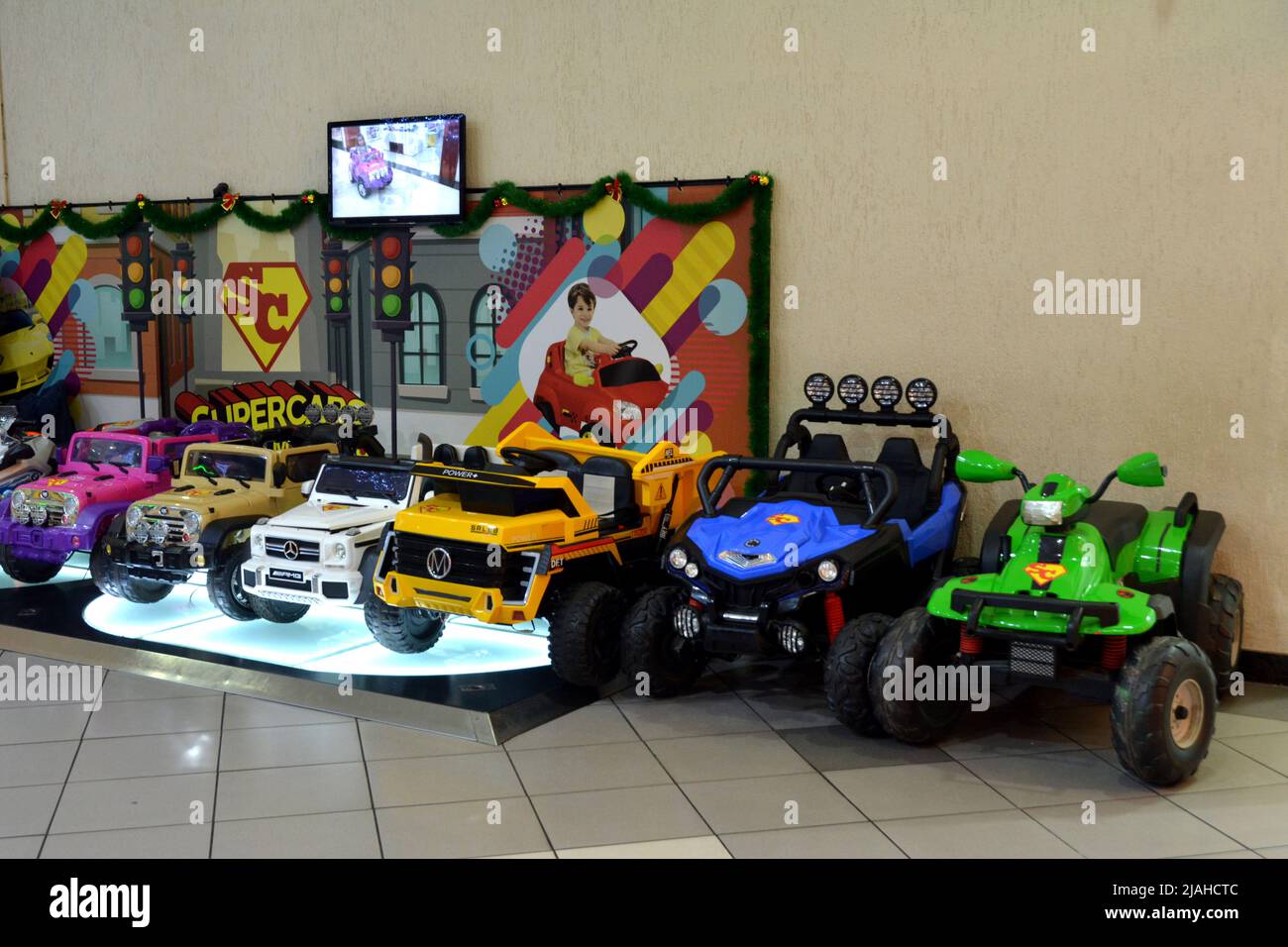 Toy Cars. Car miniatures of different types for children on display at a children's mall, Brazil, South America, availability for rent to tour the mal Stock Photo