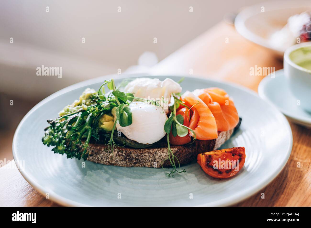 Healthy breakfast from poached eggs and veggies Stock Photo