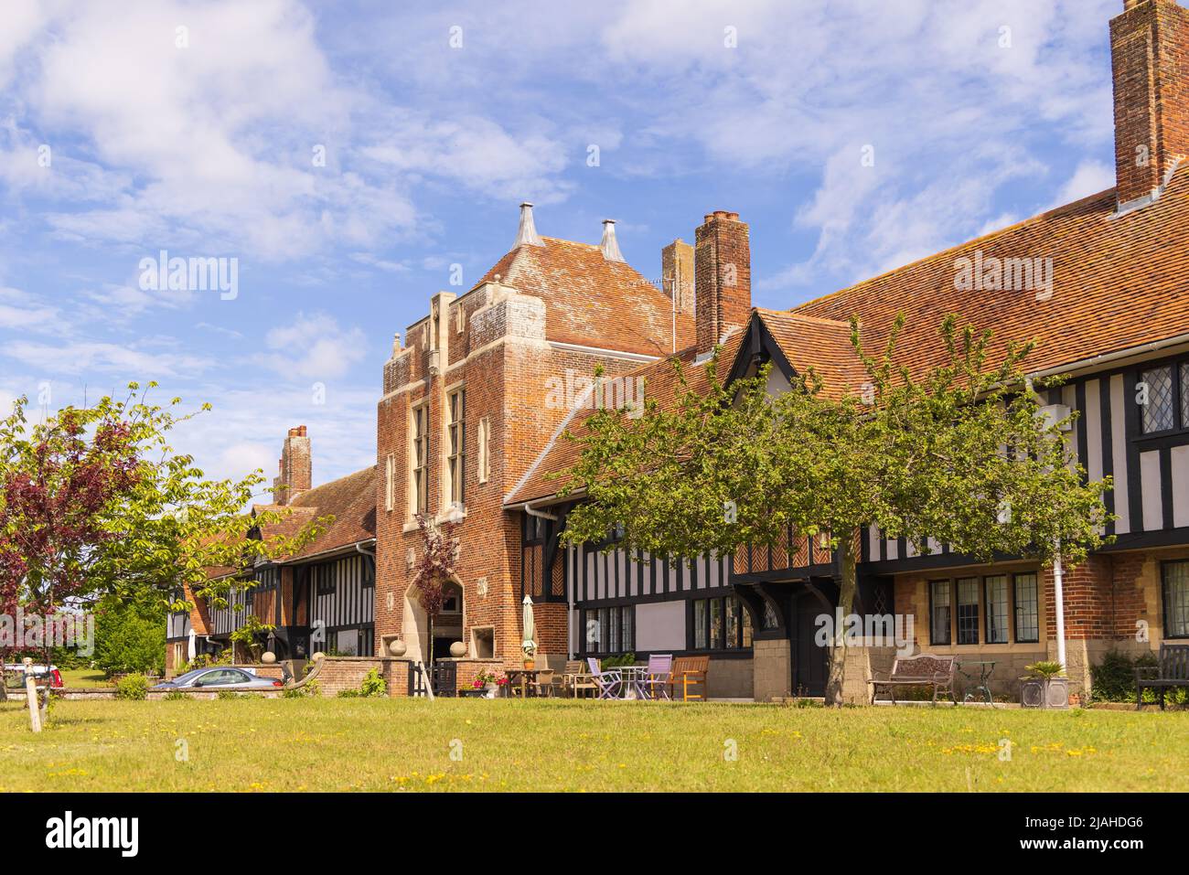 View of the Margaret Ogilvie Almshouses in Thorpeness, Suffolk. UK Stock Photo