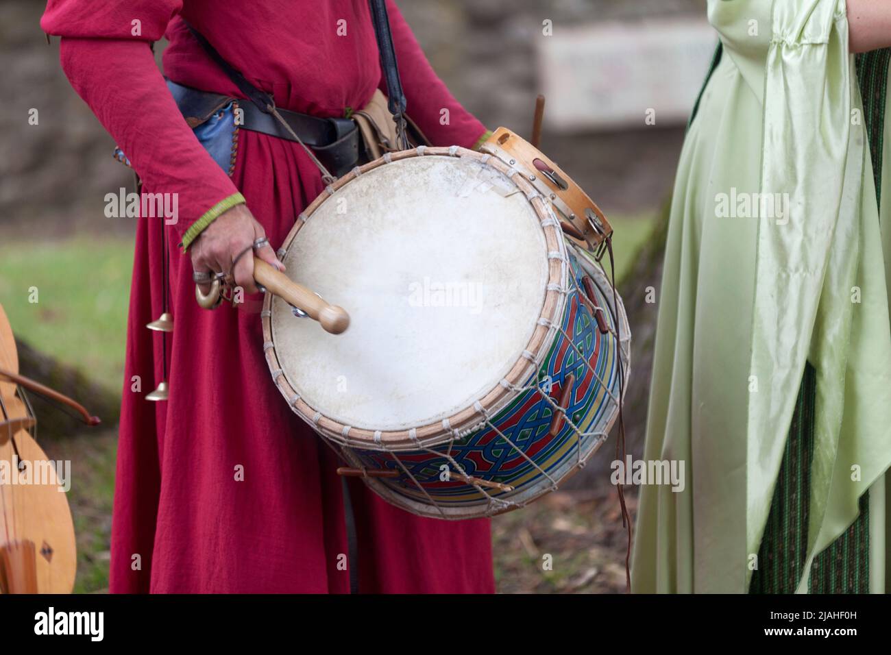 Minstrel Renaissance Medieval minstrel playing drum during the annual 'Médiévales' festival ...