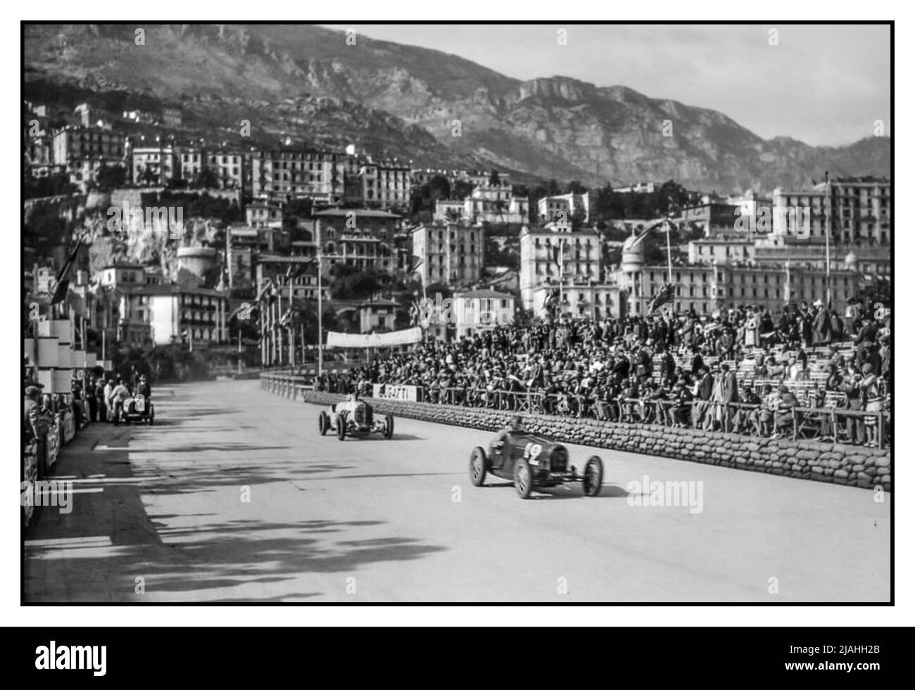 1929 Monaco Grand Prix with first-ever winner in a Bugatti car number 12.  British hero William Grover-Williams – who pocketed prize money of 100,000 French francs. Grover-Williams served in the Second World War working as a special agent for the Special Operations Executive (a British-based intelligence organisation) inside France. Arrested by the intelligence agency of the Nazi Party towards the end of the war, he was executed at the Sachsenhausen concentration camp in 1945. Stock Photo