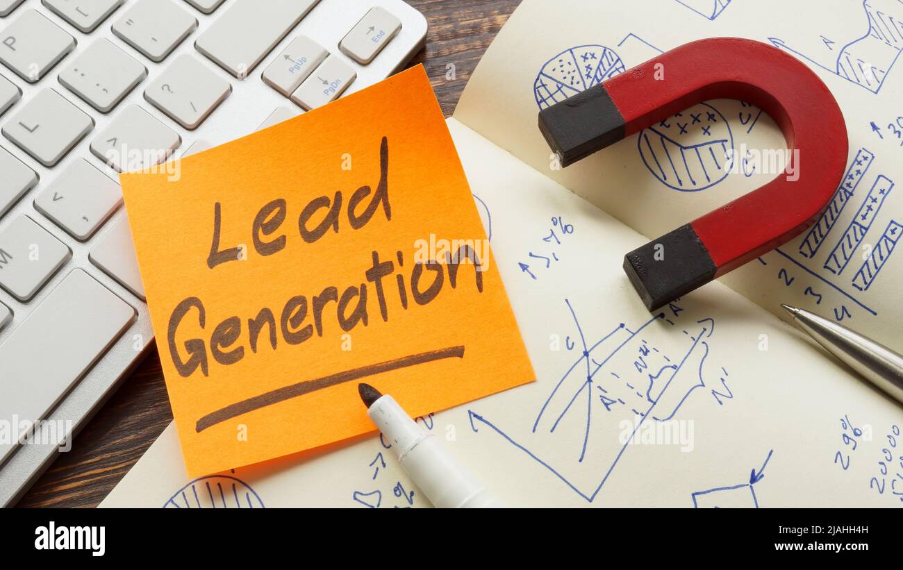 Lead generation sign and magnet on the notebook. Stock Photo