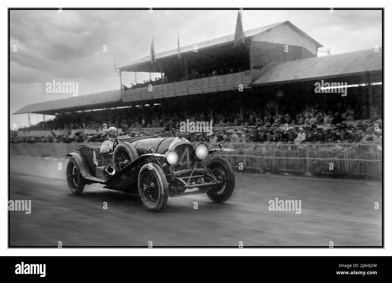 1928 LE MANS 24 HRS WINNER Bentley Number 4 of Barnato and Rubin at dusk VINTAGE 24 Hours of Le Mans motor race. The 1928 24 Hours of Le Mans was the 6th Grand Prix of Endurance that took place at the Circuit de la Sarthe on 16 and 17 June 1928. Bentley director Woolf LE MANSBarnato and Australian-born Bernard Rubin in a Bentley 4½ Litre gave the company back-to-back victories after a race-long duel with the Stutz of Édouard Brisson and Robert Bloch. In the process they won the inaugural prize for overall distance. 'The Bentley Boys' Le Mans France Stock Photo