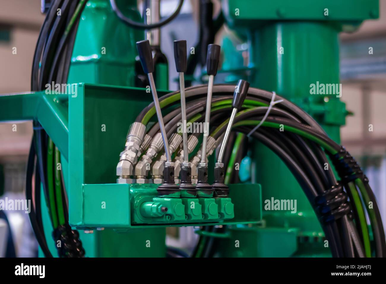 Hydraulic manual control levers of agriculture machine equipment