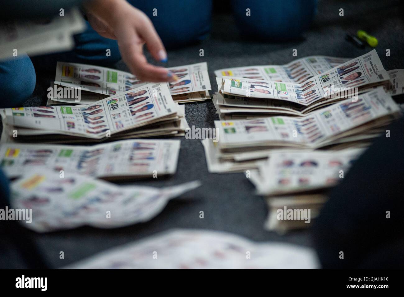 Electoral jury members count votes after elections rally ended during the 2022 Presidential elections in Bogota, Colombia on May 29, 2022. Stock Photo