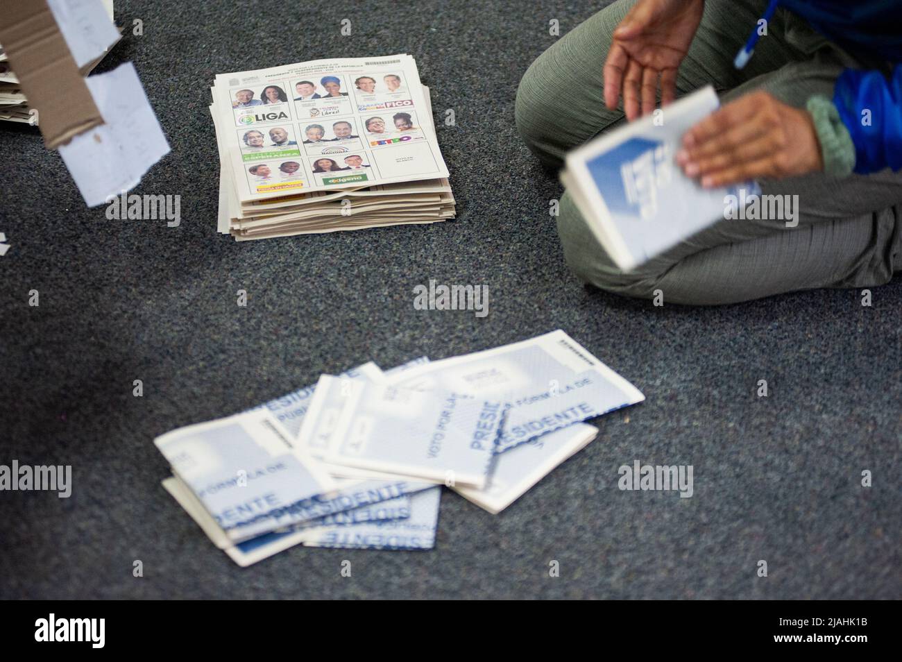 Electoral jury members count votes after elections rally ended during the 2022 Presidential elections in Bogota, Colombia on May 29, 2022. Stock Photo