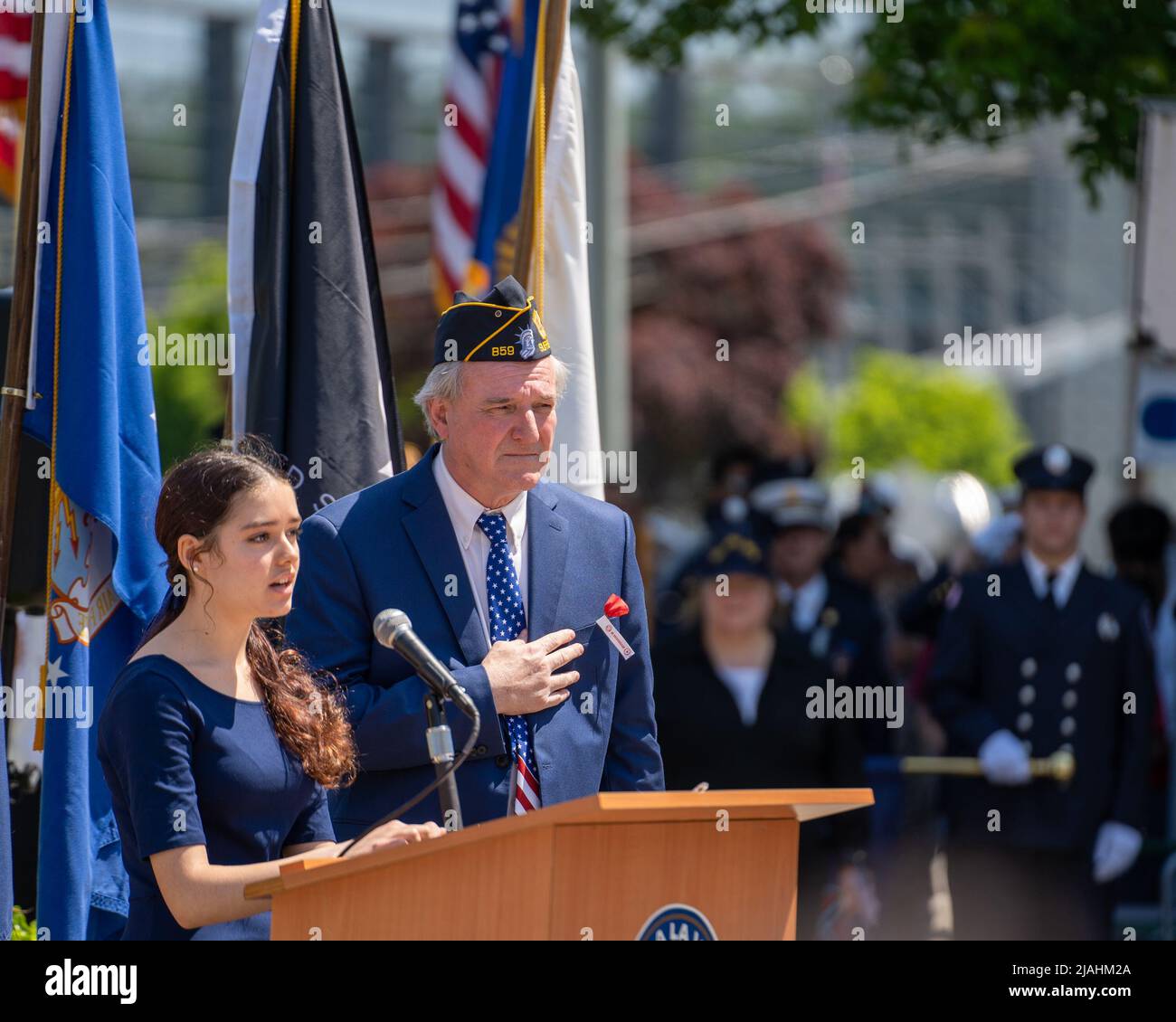 Suffern, NY - USA - May 30, 2022 The star-spangled banner sung at the Annual Memorial Day Parade and Ceremony. In front of the Washington Avenue Soldi Stock Photo