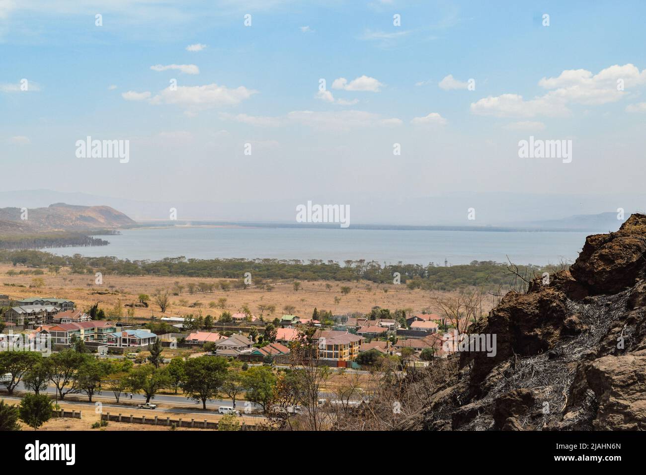 High angle view of Nakuru Town against the background of Lake Nakuru, Kenya Stock Photo