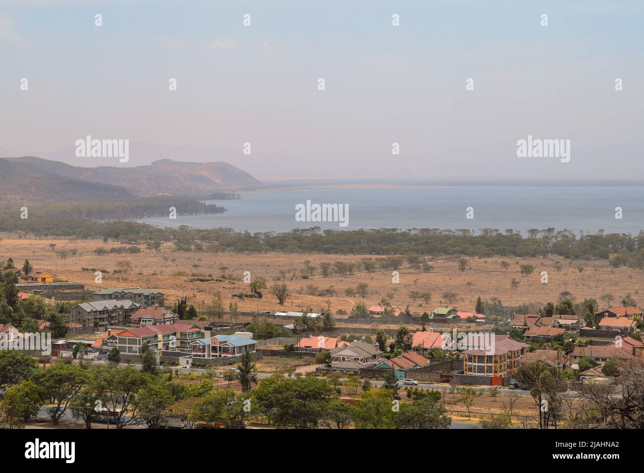 High angle view of Nakuru Town against the background of Lake Nakuru, Kenya Stock Photo
