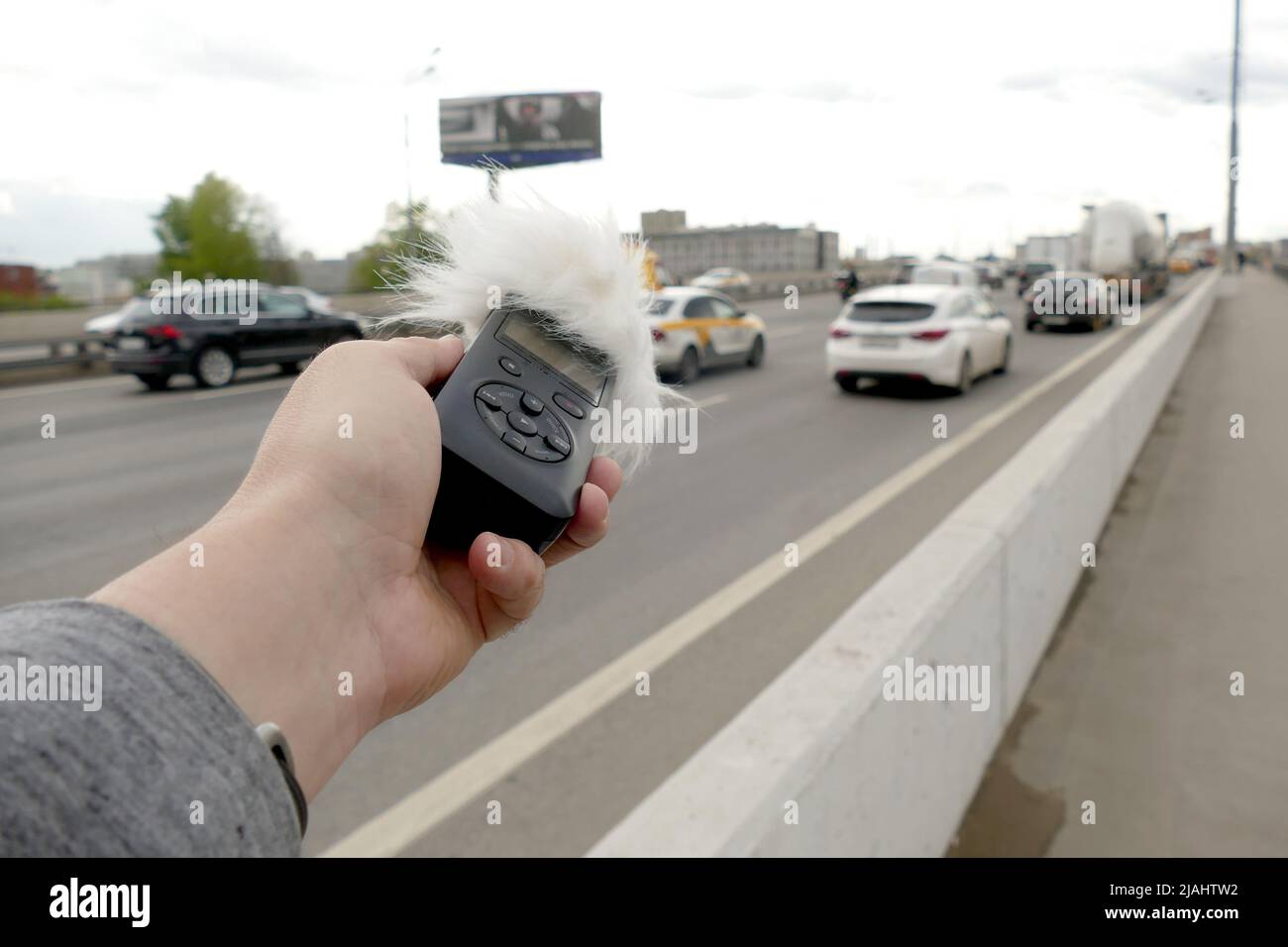 Voice recorder in hand. Recording sound effects, and ADR. Sounds of