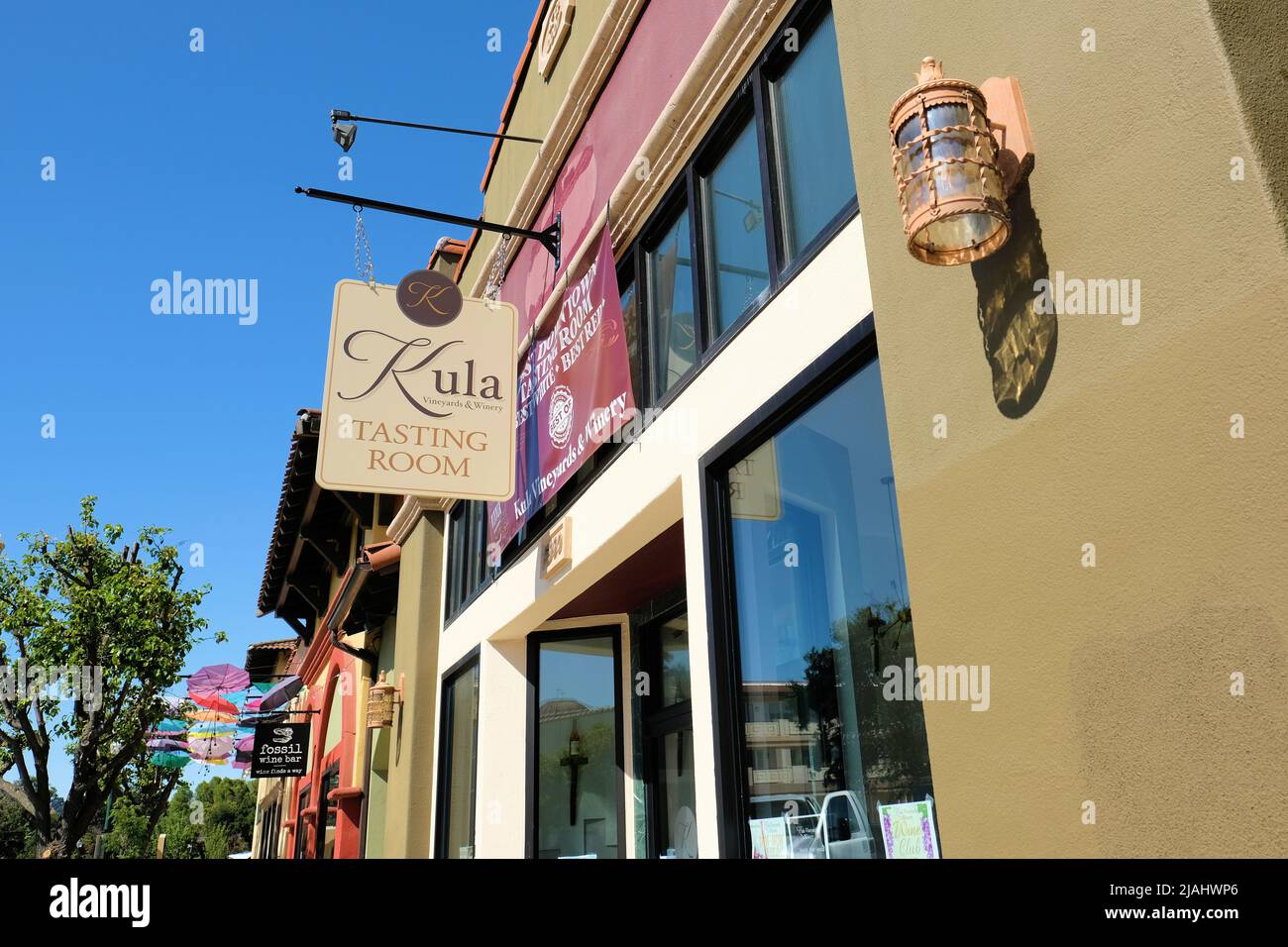 Exterior sign at the Kula Vineyard and Winery tasting room in Atascadero, California, USA; downtown Colony District. Stock Photo