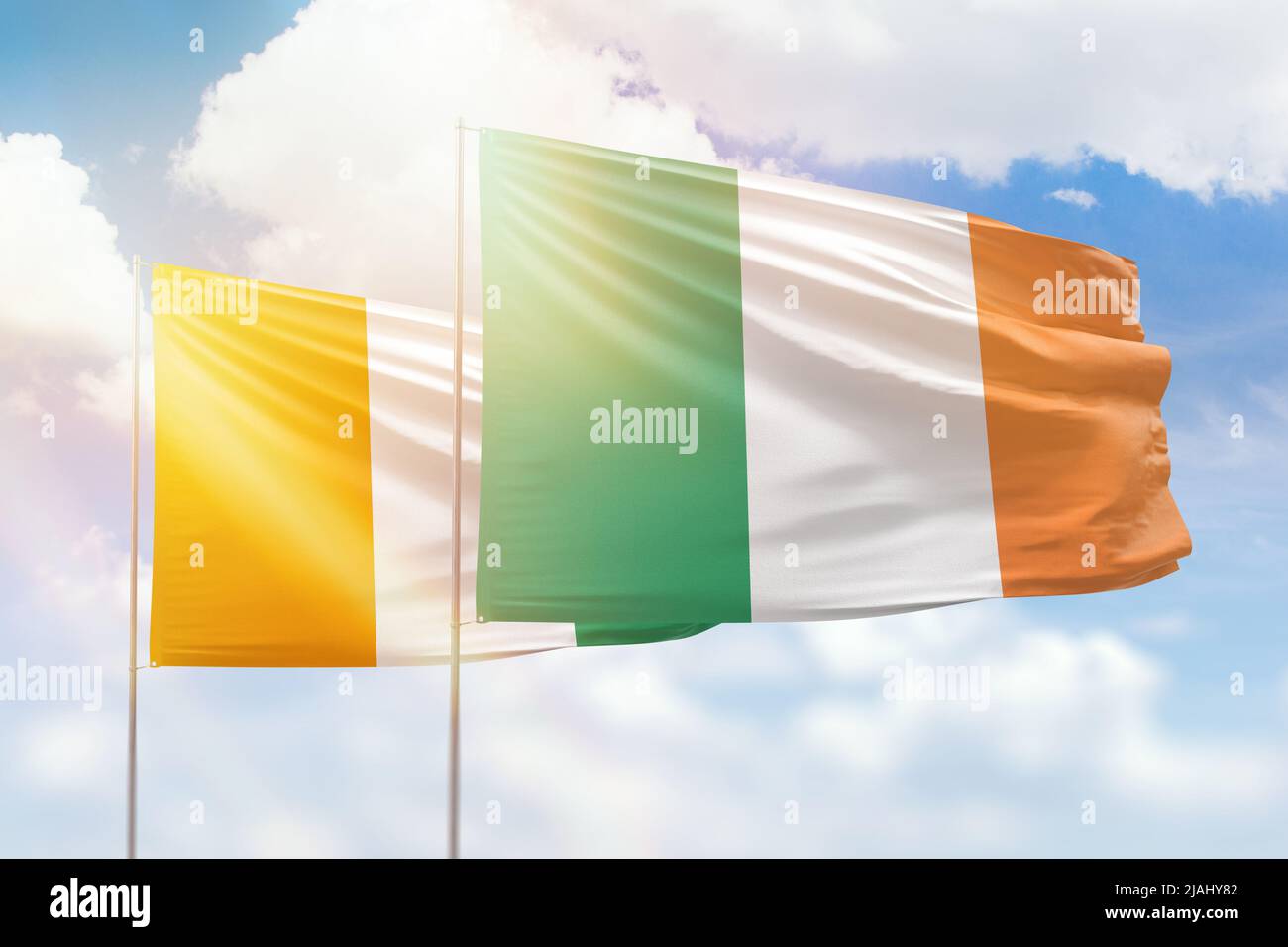 serviet karakterisere lige Sunny blue sky and flags of ireland and ivory coast Stock Photo - Alamy