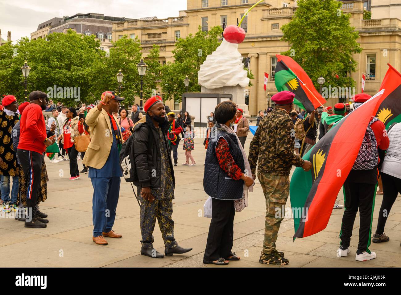London, UK, 30th May 2022. Supporters of the Indigenous People of Biafra (IPOB) stage a colourful, tuneful and peaceful demonstration in Trafalgar Square. The protest group supports a free Biafra, a region of Nigeria. Paul Biggins/Alamy Live News Stock Photo