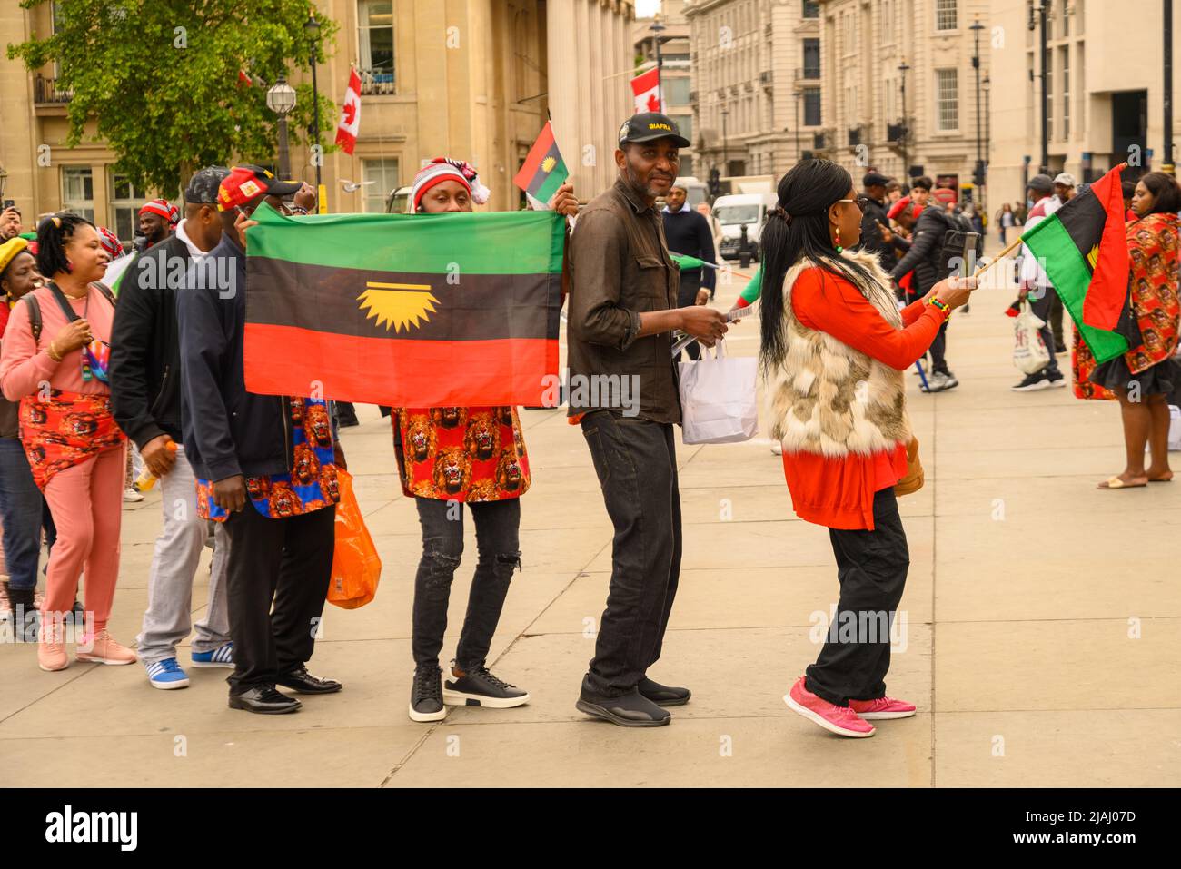 London, UK, 30th May 2022. Supporters of the Indigenous People of Biafra (IPOB) stage a colourful, tuneful and peaceful demonstration in Trafalgar Square. The protest group supports a free Biafra, a region of Nigeria. Paul Biggins/Alamy Live News Stock Photo