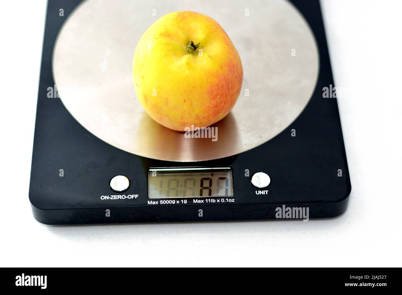 weight scales calories eating eat eats apple healthy health model design  Stock Photo - Alamy