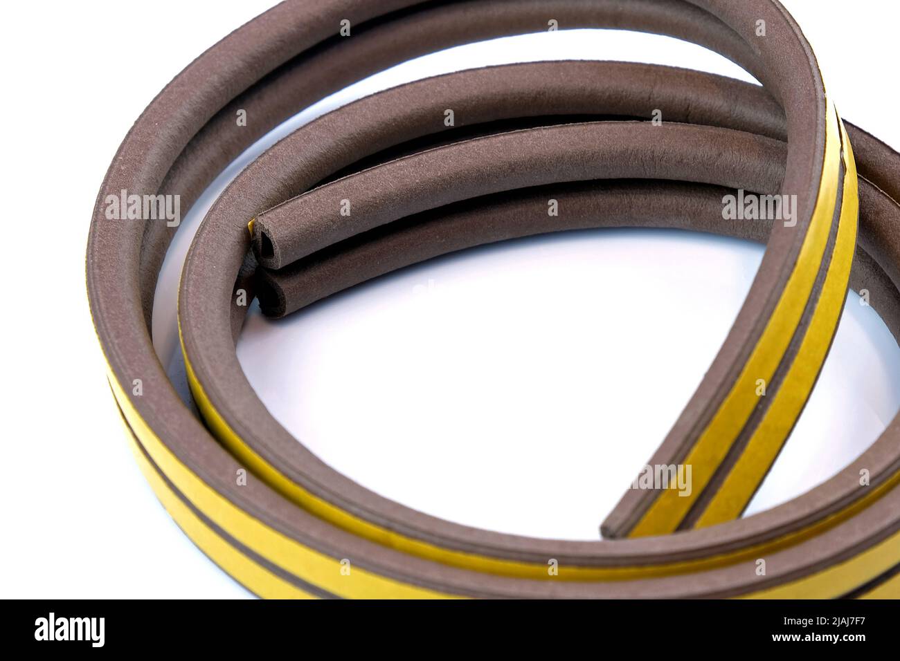 Brown seal universal selfadhesive for doors and windows. Self adhesive yellow rubber sealing